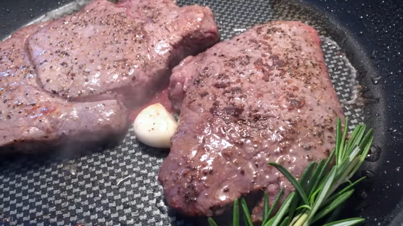 seasoned steak into the crock pot