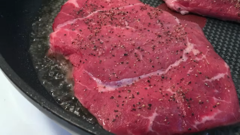 steak with fresh herbs and spices