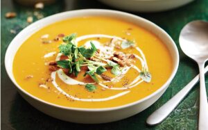 Enjoy a warm, Creamy Pumpkin Soup with a hint of coconut, rich in flavor and health benefits.